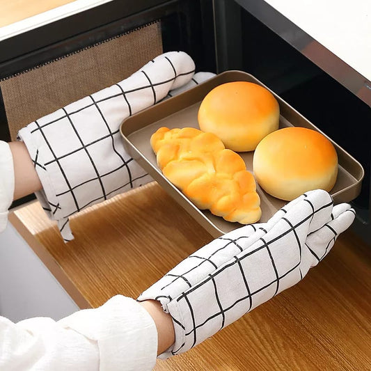 A pair of cotton oven gloves