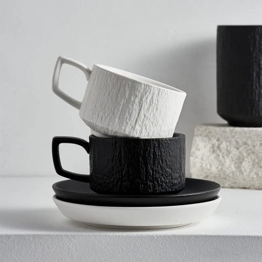 A set of 2 Cappuccino coffee cup set with saucers.