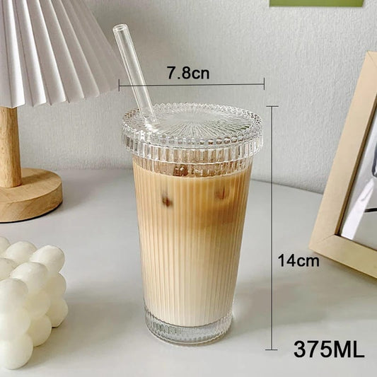 Ribbed glass cup with straw*