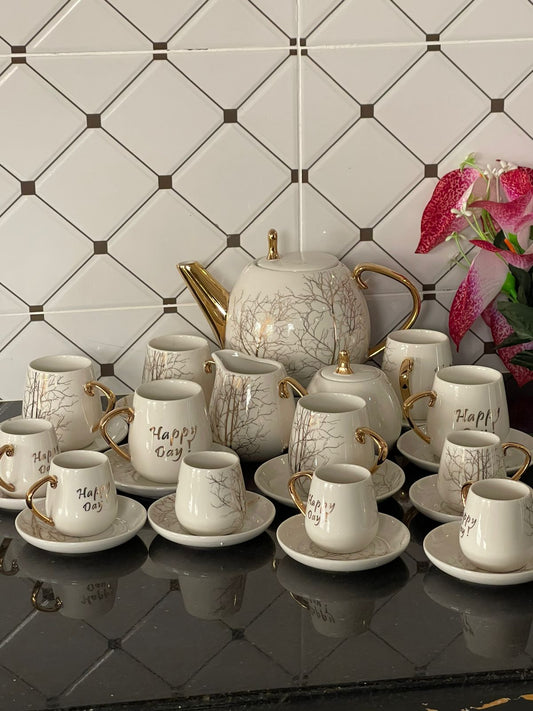 27pcs Tree Tea Set with palm tree design and gold touch. 