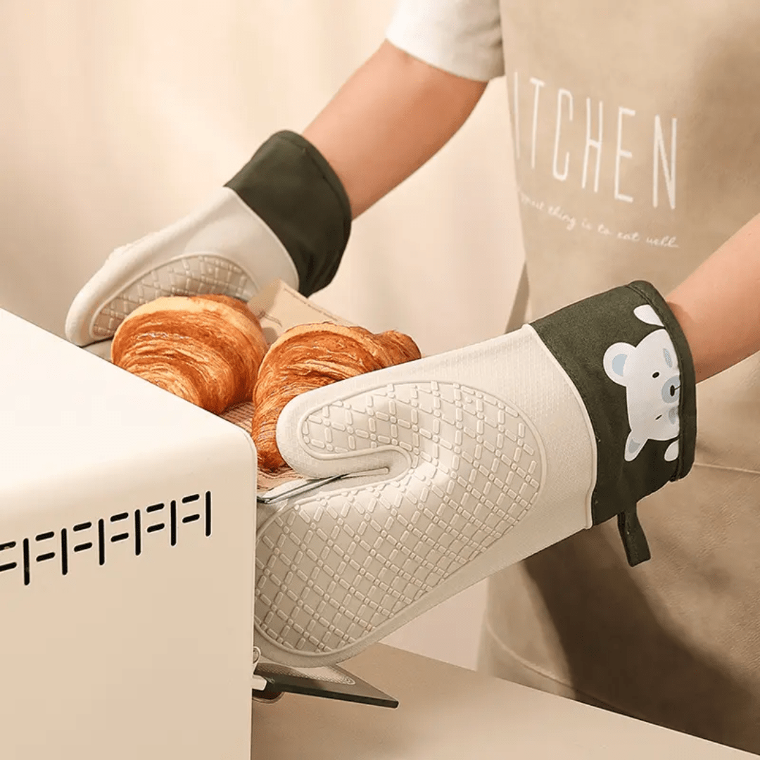 A pair of Silicone Heat - Insulating Gloves | - Elegant Households KE