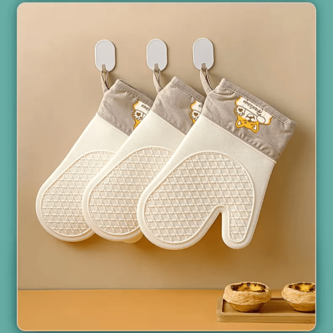 A pair of Silicone Heat - Insulating Gloves | - Elegant Households KE