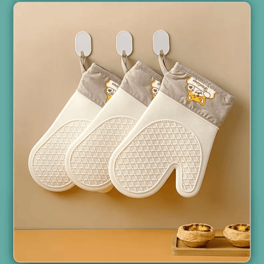 A pair of Silicone Heat - Insulating Gloves | - Elegant Households KE
