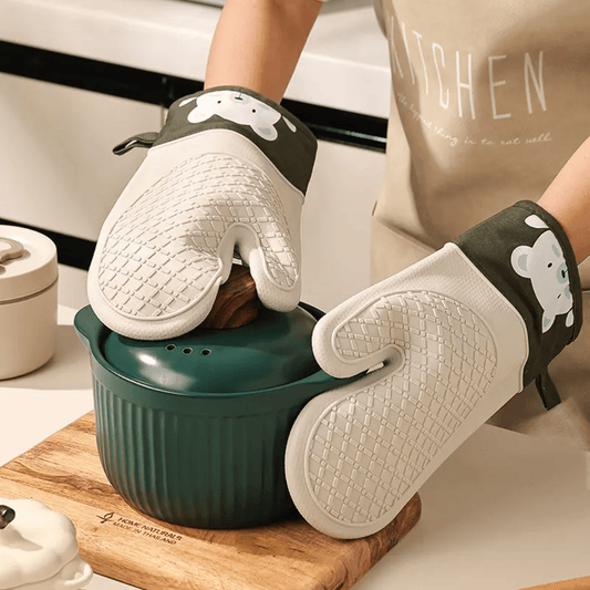 A pair of Silicone Heat - Insulating Gloves | - Elegant Households KE