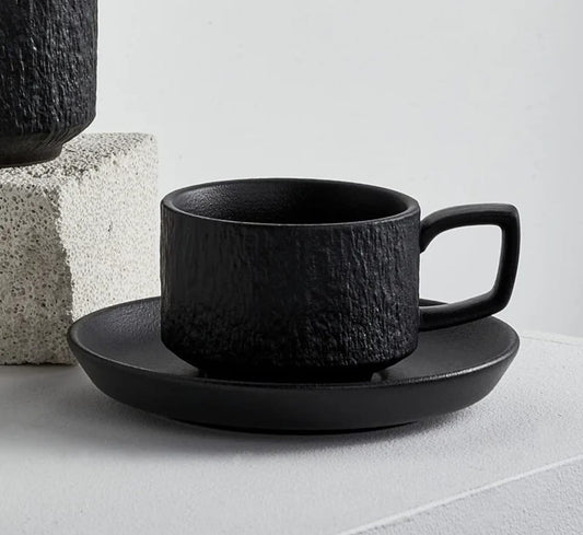 A set of 2 Cappuccino coffee cup set with saucers.